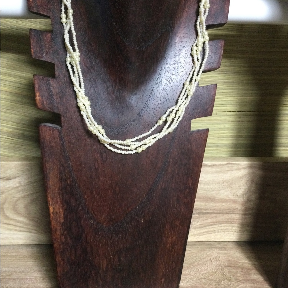Cream Multi-Strand Necklace with Intricate Design
